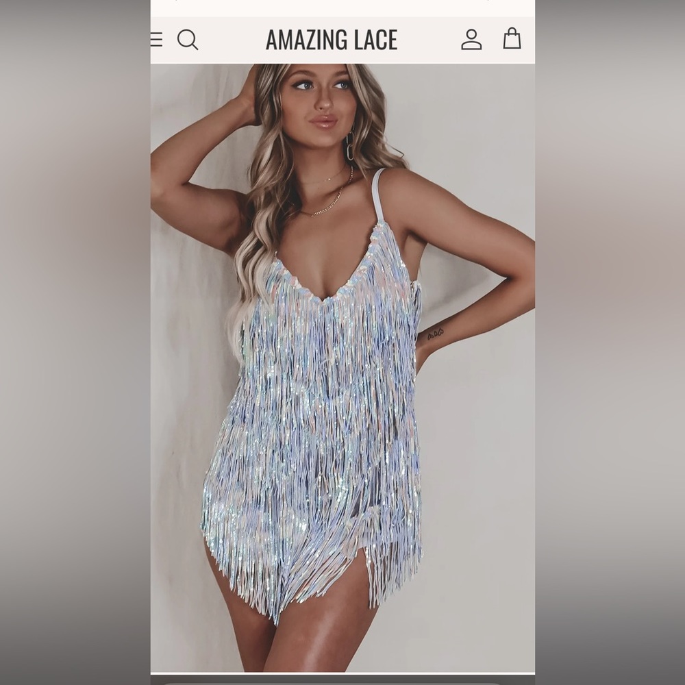 Brand new fringe dress . SHAKE IT MY WAY SHORT FRINGE MINI DRESS